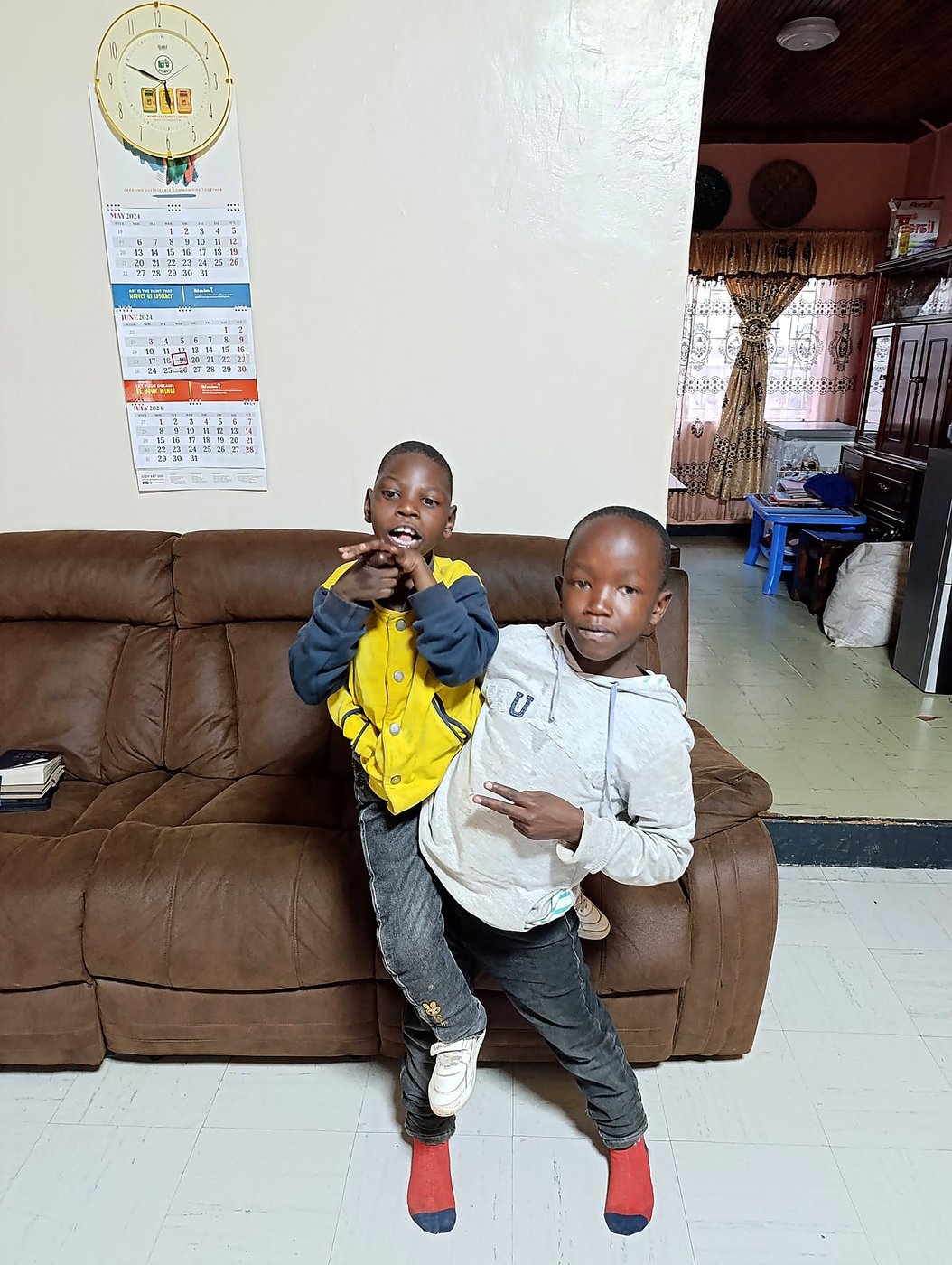 A father and child smiling at a GCIG gathering