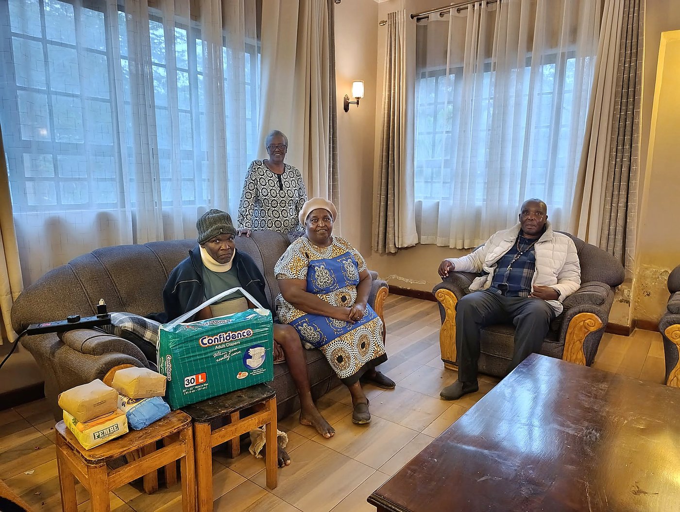 Handing over donated supplies to the community