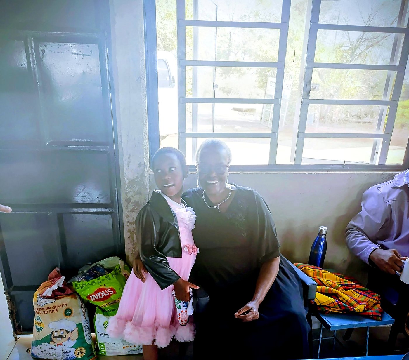 Families receiving support indoors at a GCIG event
